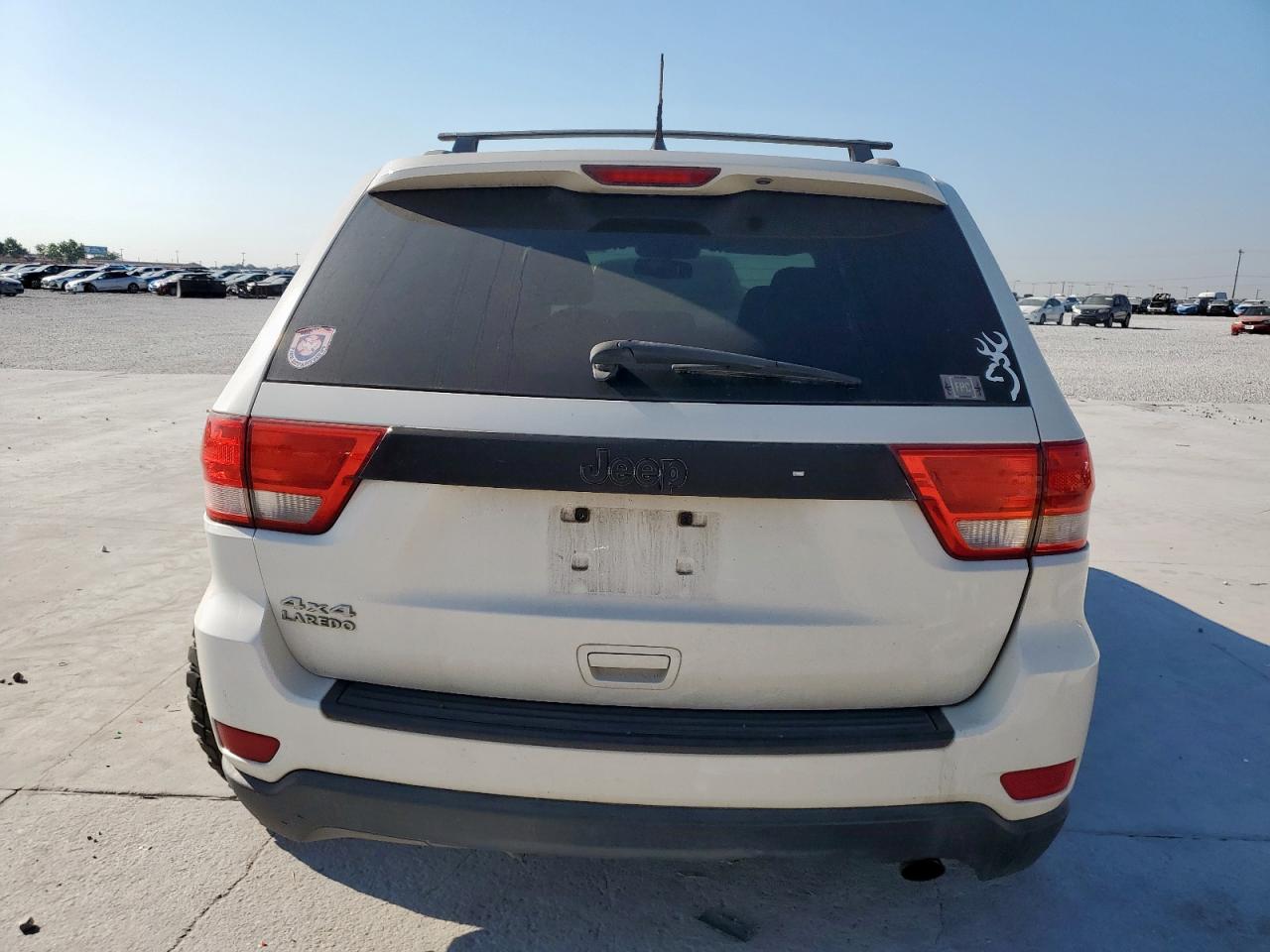 2012 Jeep Grand Cherokee Laredo VIN: 1C4RJFAG4CC256115 Lot: 81982645