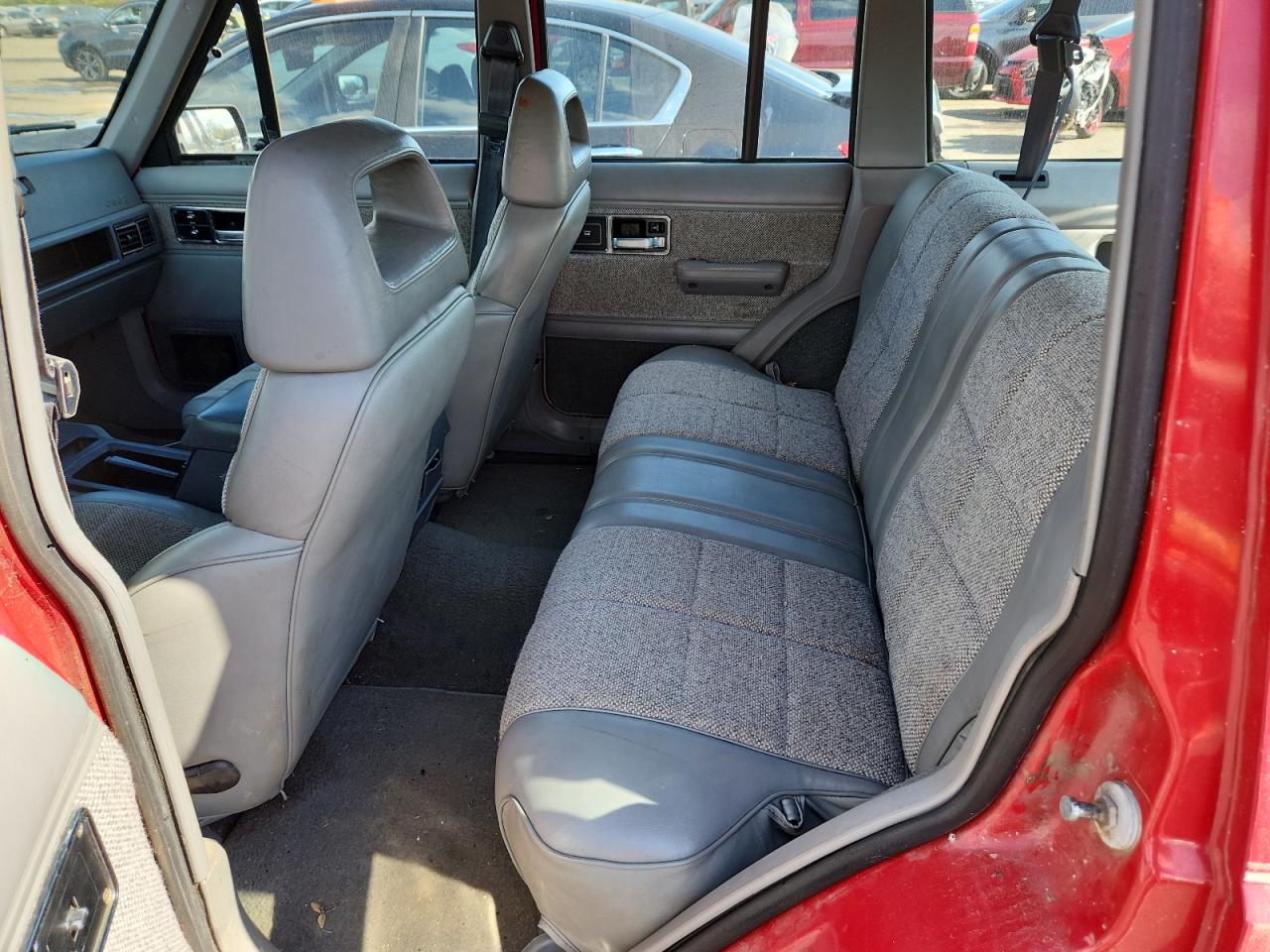 1990 Jeep Cherokee Laredo VIN: 1J4FJ58L0LL208654 Lot: 84260585