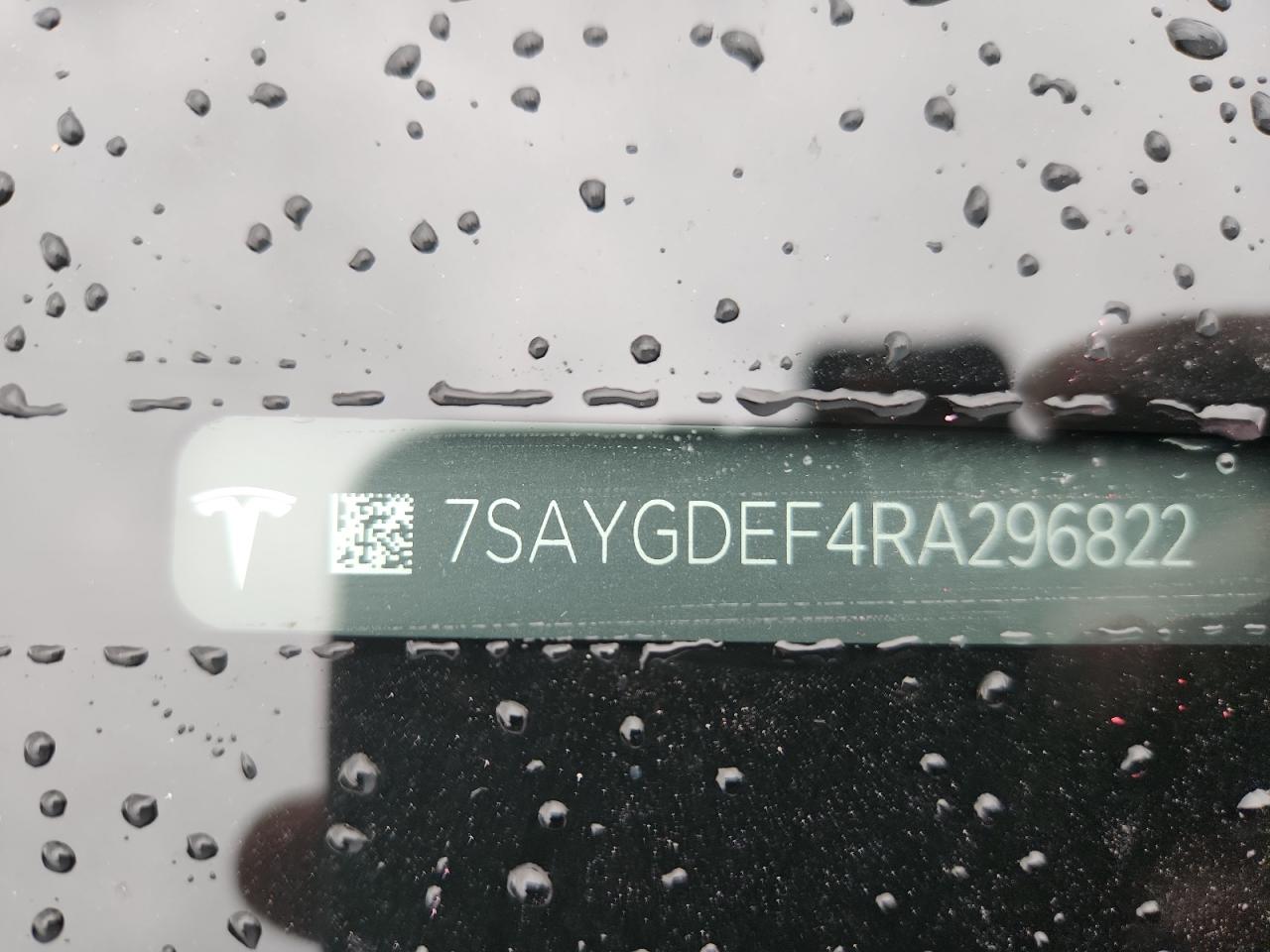 2024 Tesla Model Y VIN: 7SAYGDEF4RA296822 Lot: 84973945