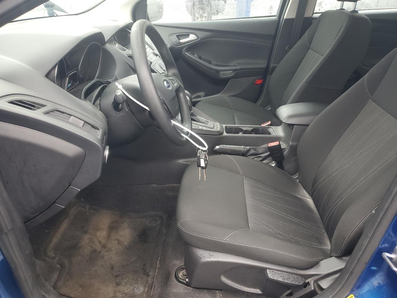 2018 Ford Focus Se VIN: 1FADP3K29JL318704 Lot: 86239395