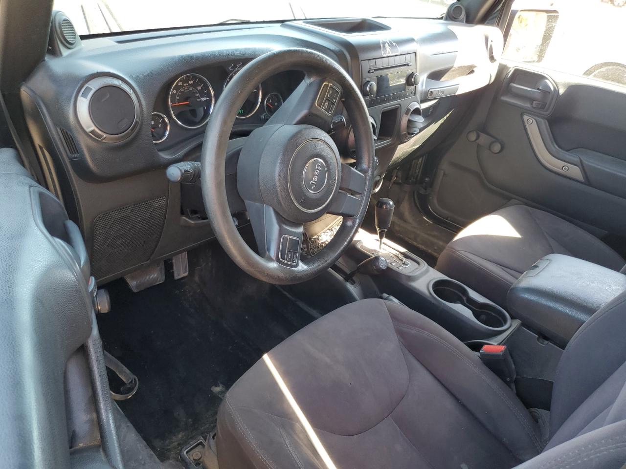 2013 Jeep Wrangler Sport VIN: 1C4AJWAGXDL704002 Lot: 85896725