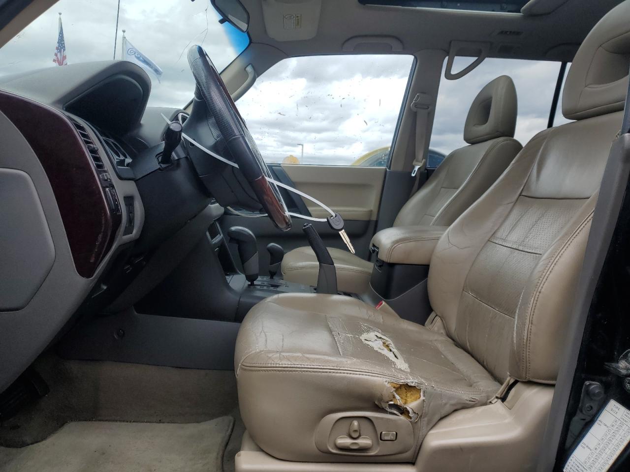 2002 Mitsubishi Montero Limited VIN: JA4MW51R42J026327 Lot: 87022265