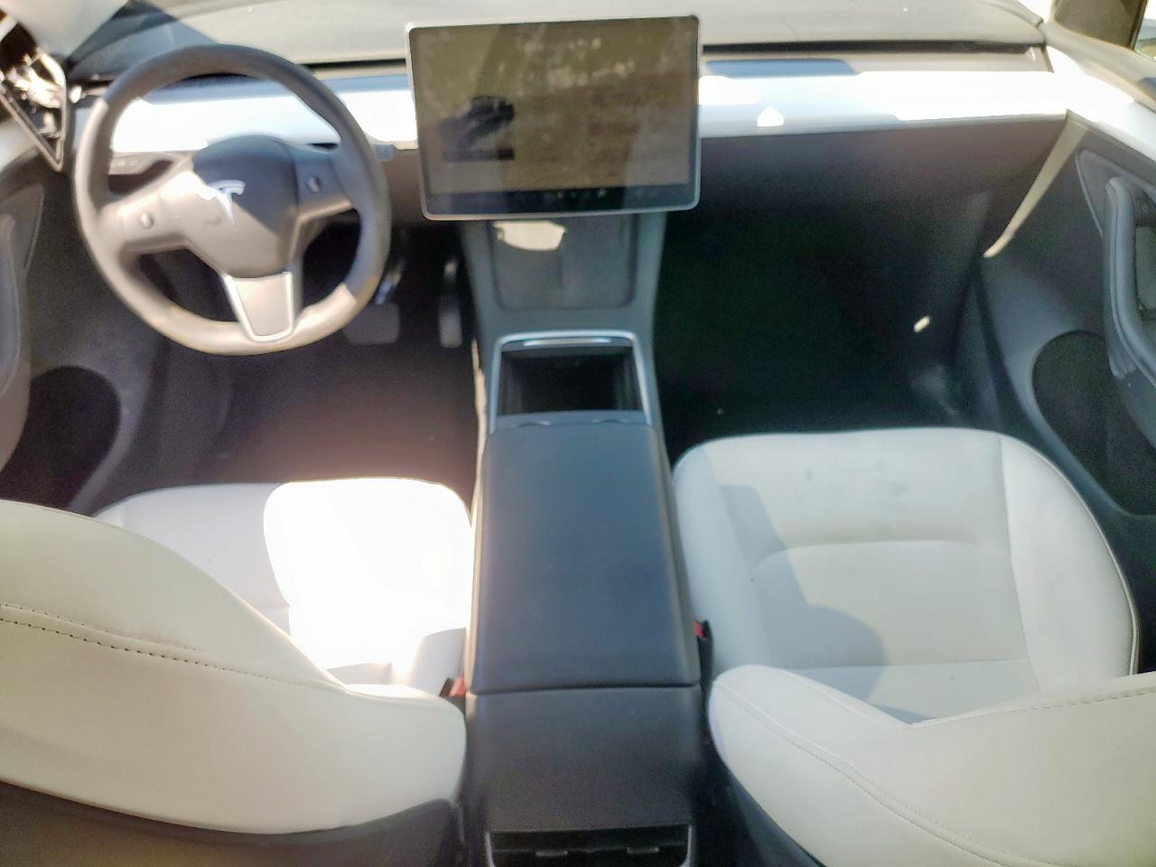 2023 Tesla Model Y VIN: 7SAYGDEEXPF609766 Lot: 85840595