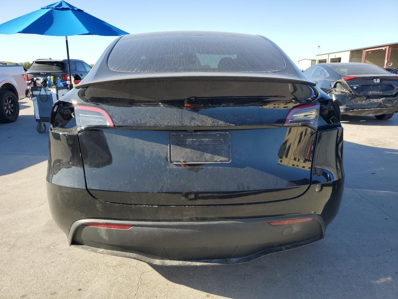 2023 Tesla Model Y VIN: 7SAYGDEF0PF947671 Lot: 86972785