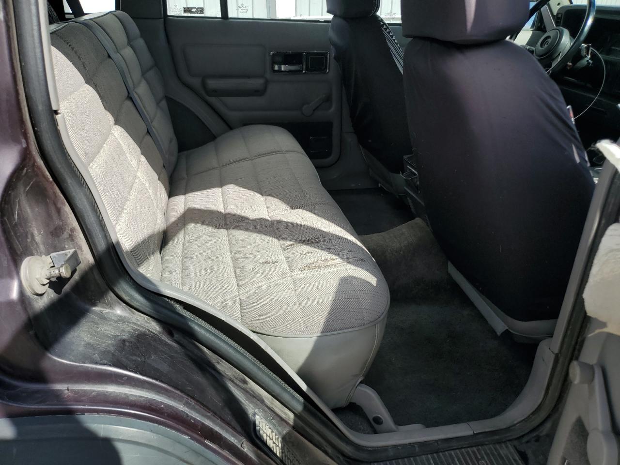 1991 Jeep Cherokee Sport VIN: 1J4FJ88S0ML569019 Lot: 85327315