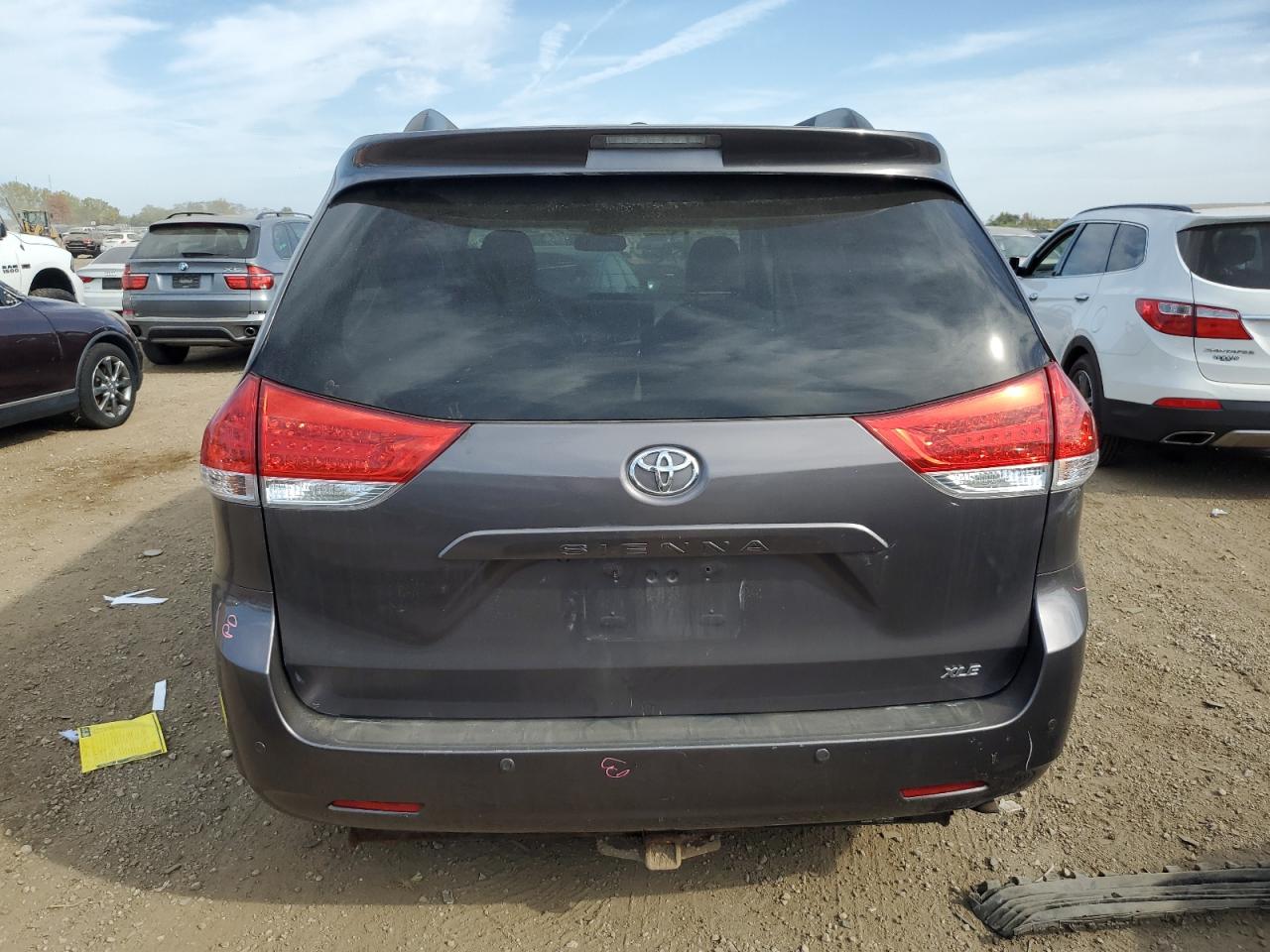 2012 Toyota Sienna Xle VIN: 5TDYK3DC8CS279265 Lot: 82003505