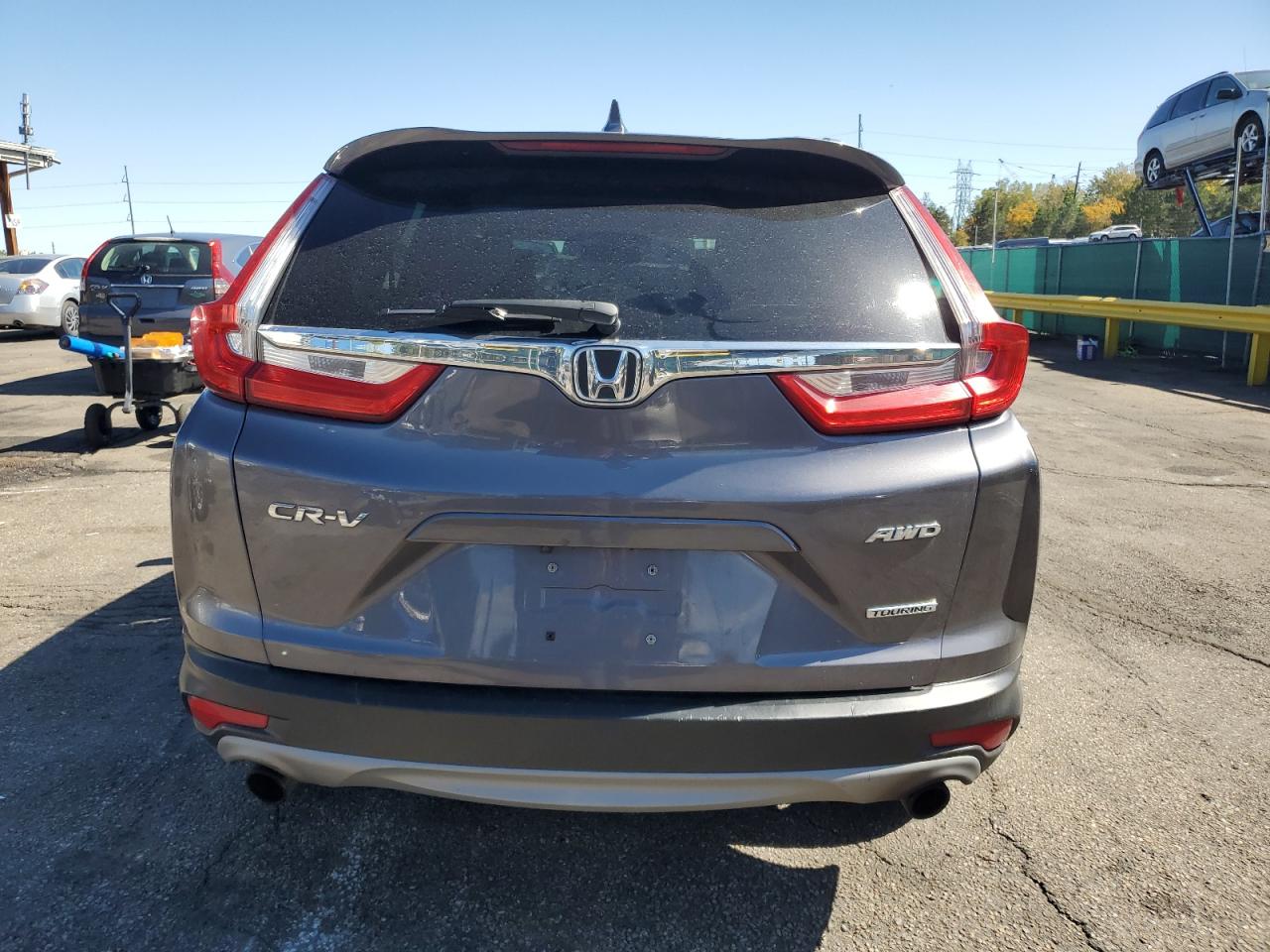 2018 Honda Cr-V Touring VIN: 7FARW2H99JE099137 Lot: 84780375