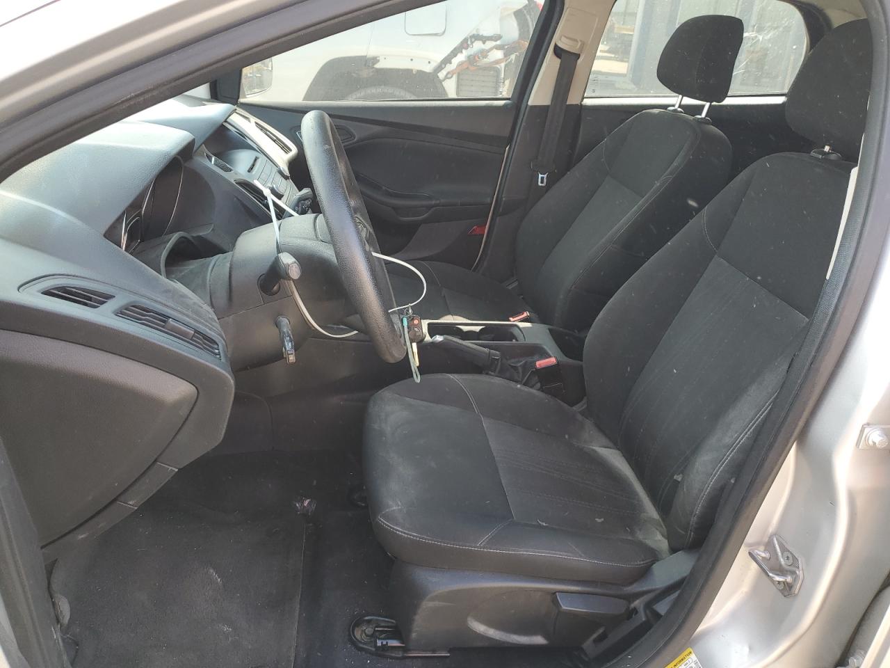 2015 Ford Focus S VIN: 1FADP3E27FL275015 Lot: 84890745