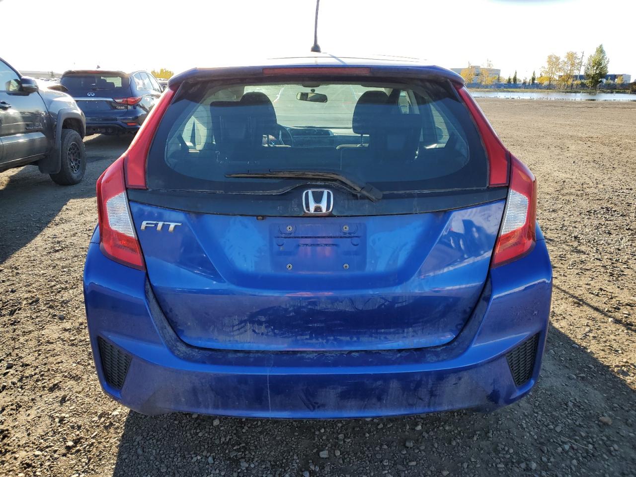2015 Honda Fit Lx VIN: 3HGGK5H50FM101052 Lot: 85876415