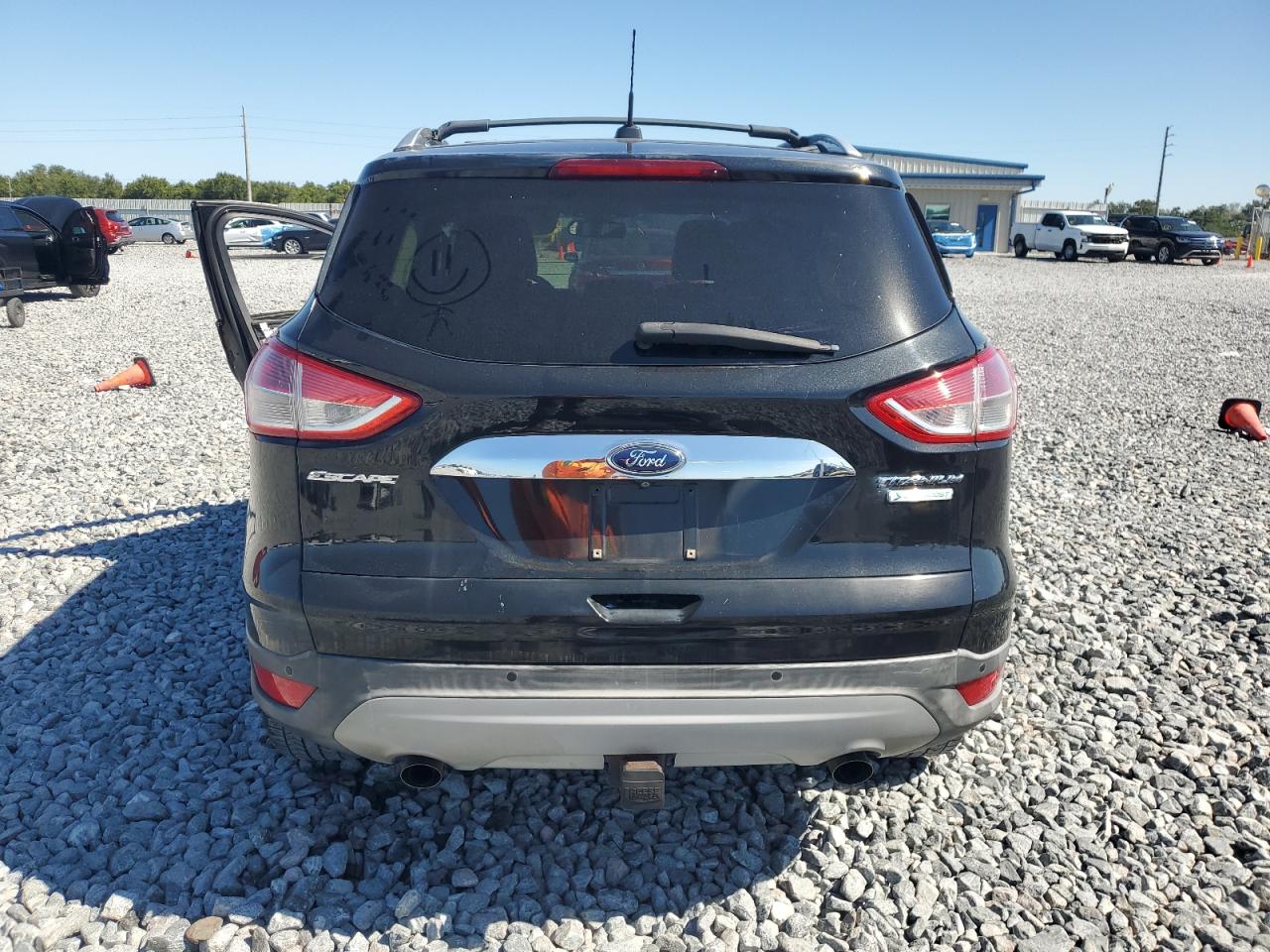 2014 Ford Escape Titanium VIN: 1FMCU0J94EUA02943 Lot: 91030045