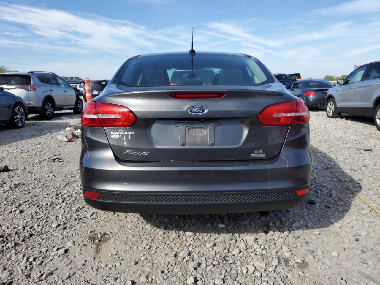 2018 Ford Focus Se VIN: 1FADP3FE7JL278353 Lot: 84604135