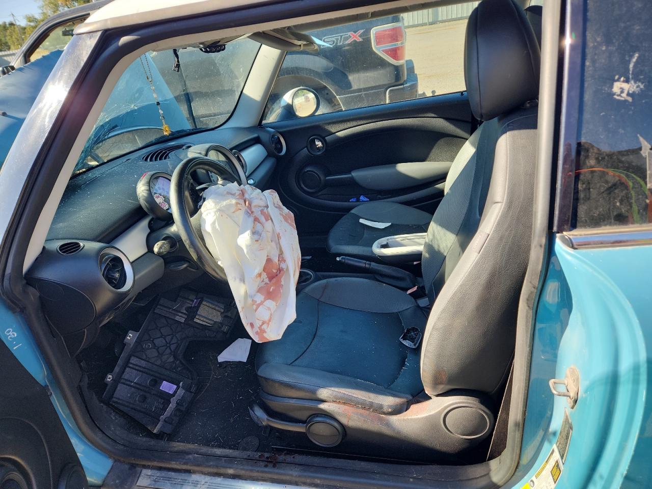 2009 Mini Cooper VIN: WMWMF33589TW79985 Lot: 90891475