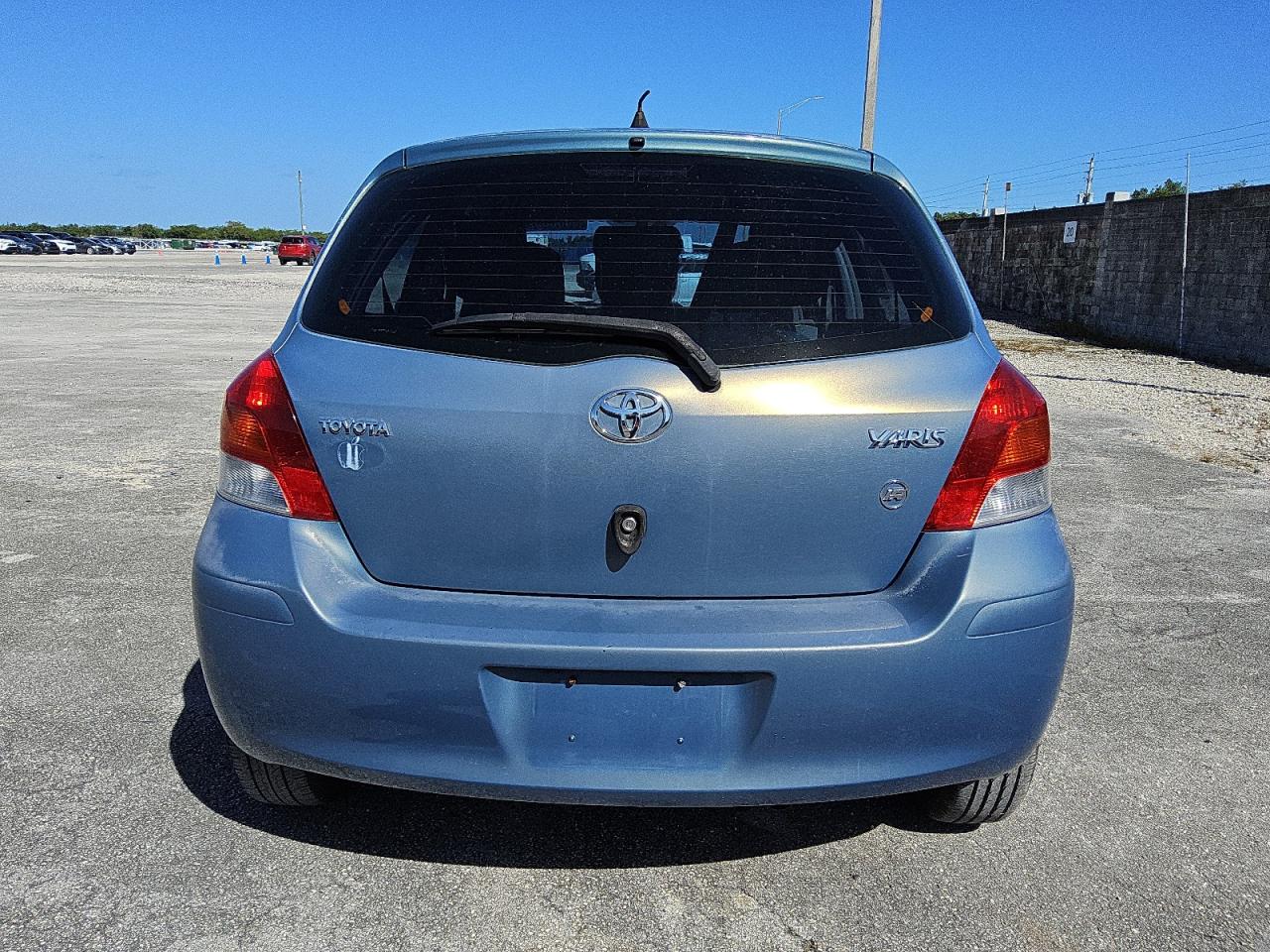 2009 Toyota Yaris VIN: JTDKT903795247658 Lot: 90686525