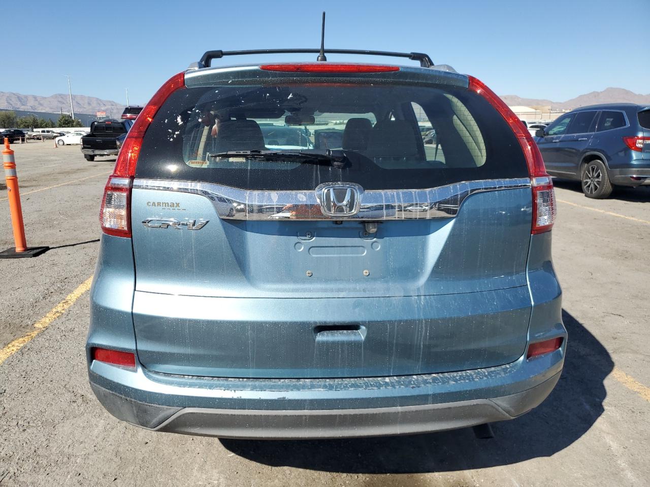 2015 Honda Cr-V Lx VIN: 2HKRM3H31FH554137 Lot: 82005715