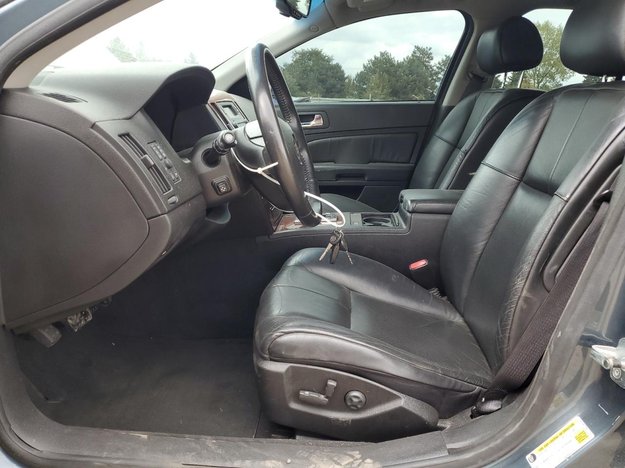 2006 Cadillac Sts VIN: 1G6DW677560217318 Lot: 84292475