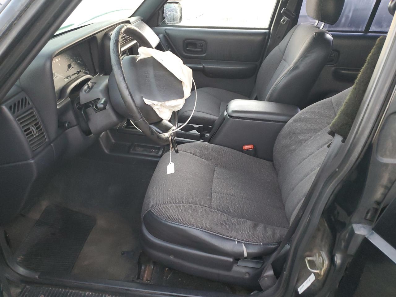 1999 Jeep Cherokee Sport VIN: 1J4FT68S2XL670579 Lot: 90354775