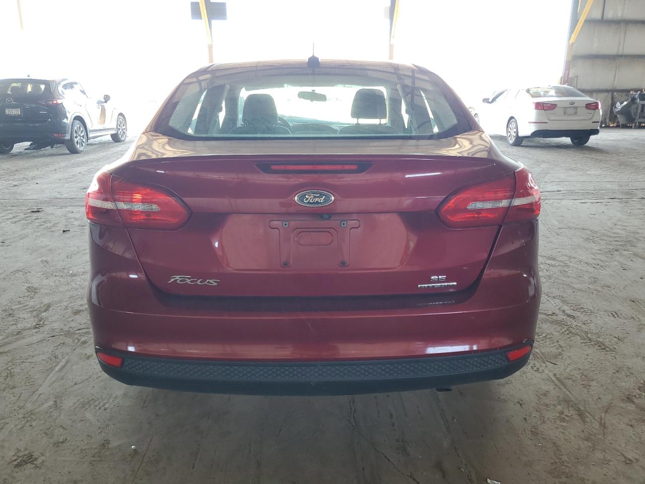 2016 Ford Focus Se VIN: 1FADP3F25GL372729 Lot: 82215115