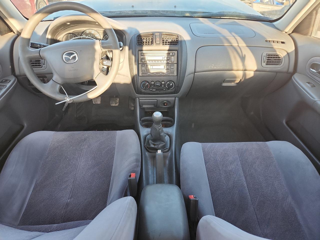 2000 Mazda Protege Es VIN: JM1BJ2218Y0210882 Lot: 84791965