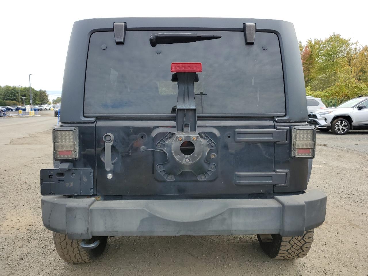 2014 Jeep Wrangler Unlimited Sport VIN: 1C4BJWDG3EL175221 Lot: 86885295