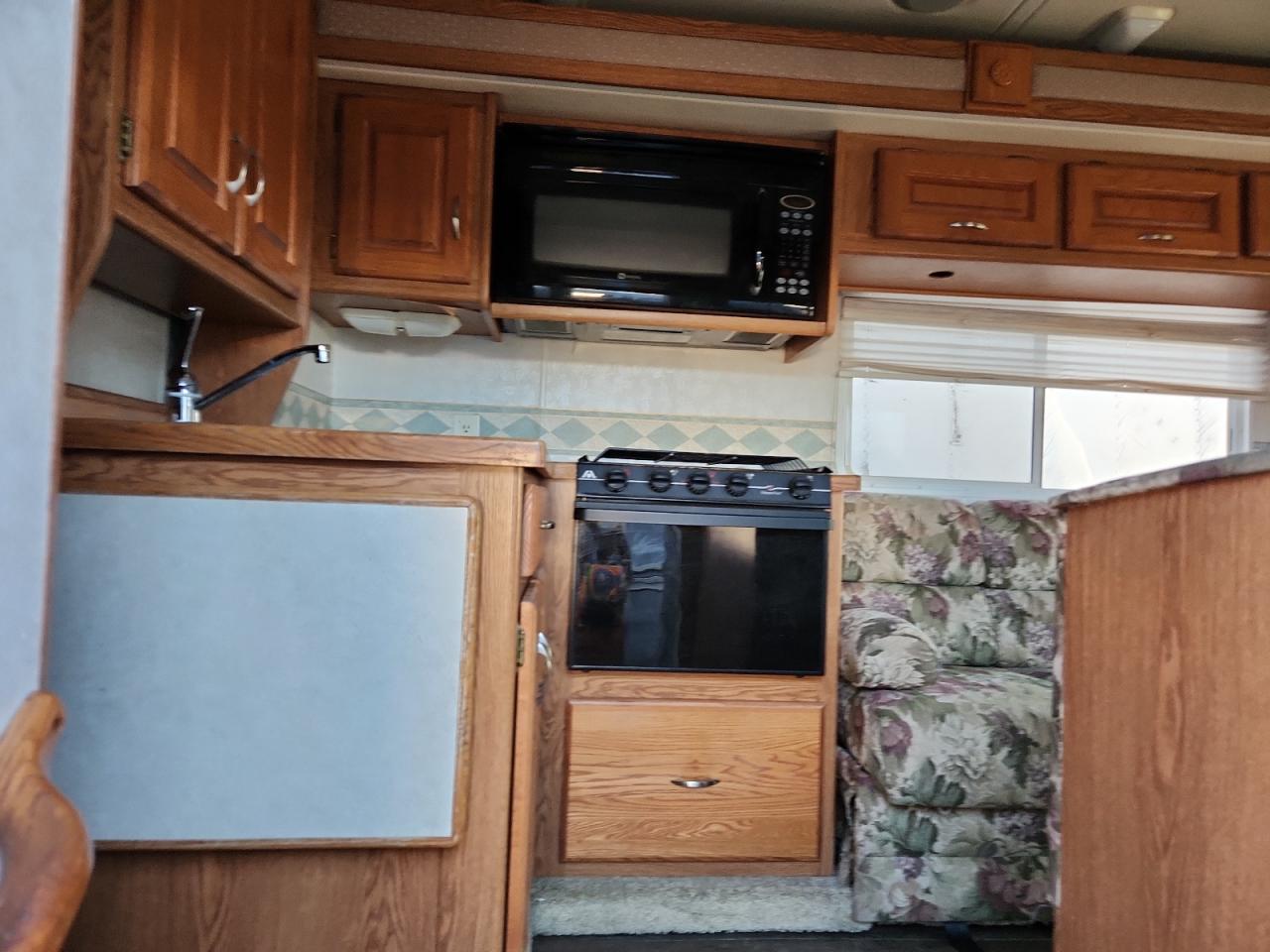 2002 Ford Econoline E450 Super Duty Cutaway Van VIN: 1FDXE45S62HB74544 Lot: 90635905