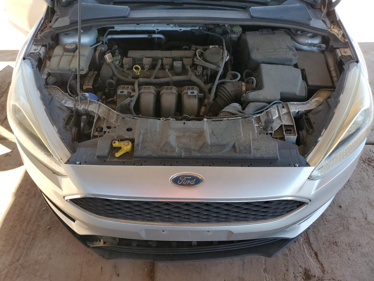 2015 Ford Focus S VIN: 1FADP3E27FL261471 Lot: 84659075