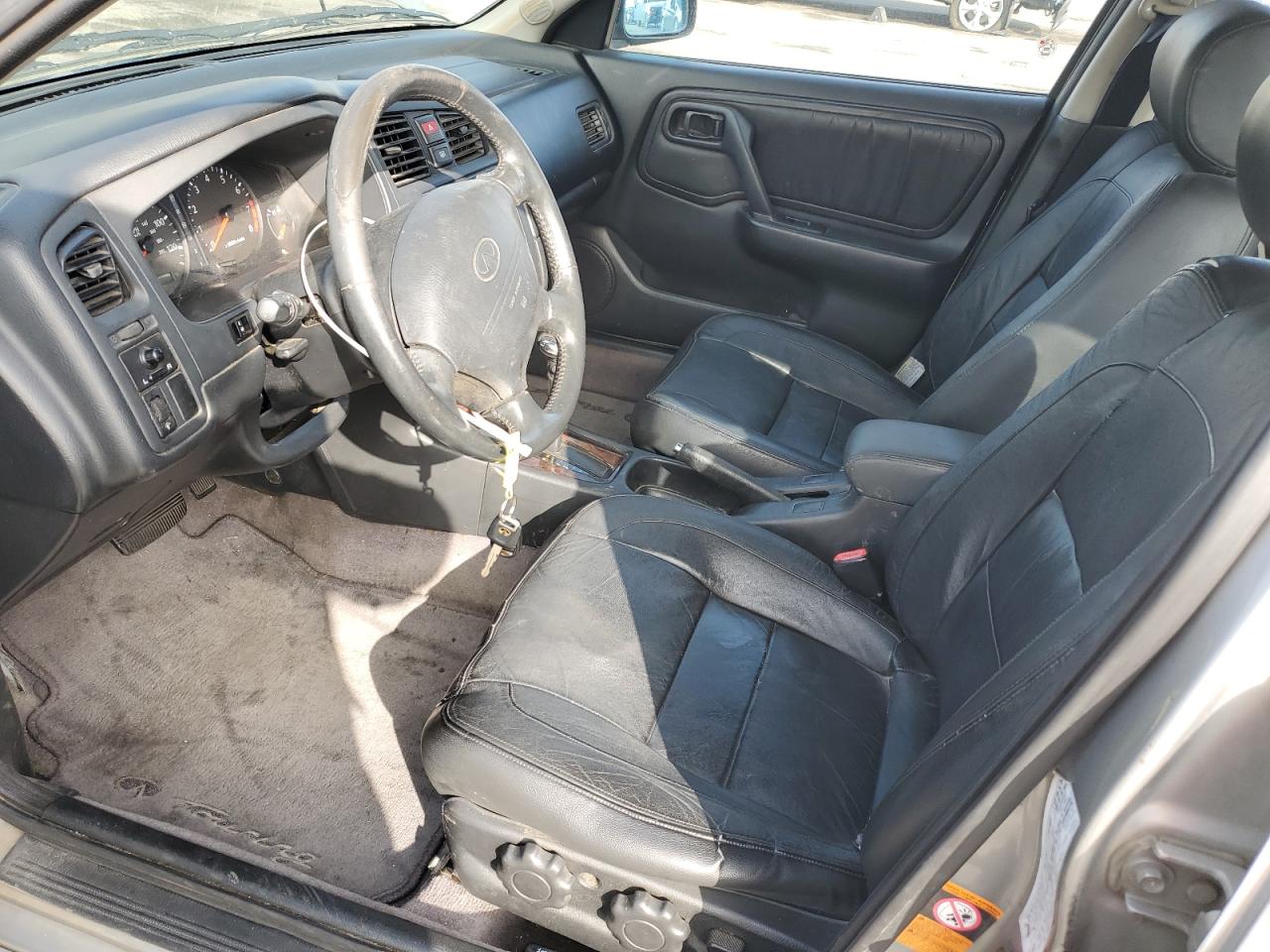 2000 Infiniti G20 VIN: JNKCP11A8YT310105 Lot: 89566605