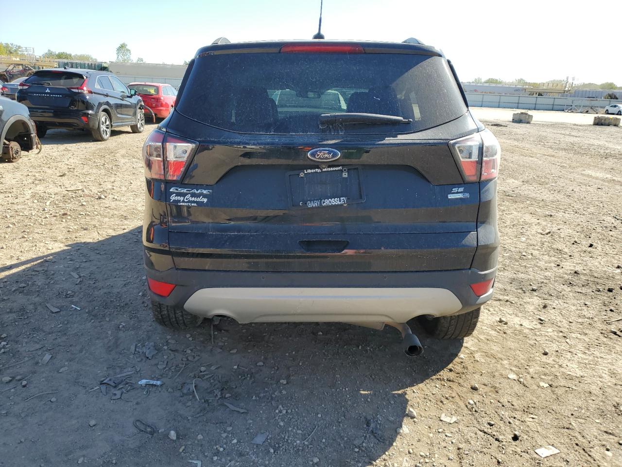 2017 Ford Escape Se VIN: 1FMCU9G91HUA81312 Lot: 82302005