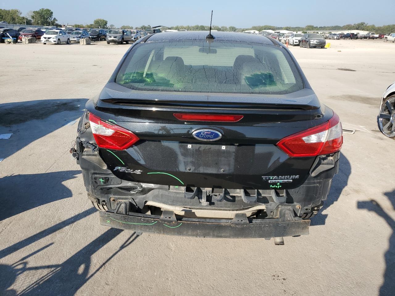 2014 Ford Focus Titanium VIN: 1FADP3J2XEL161594 Lot: 82163935