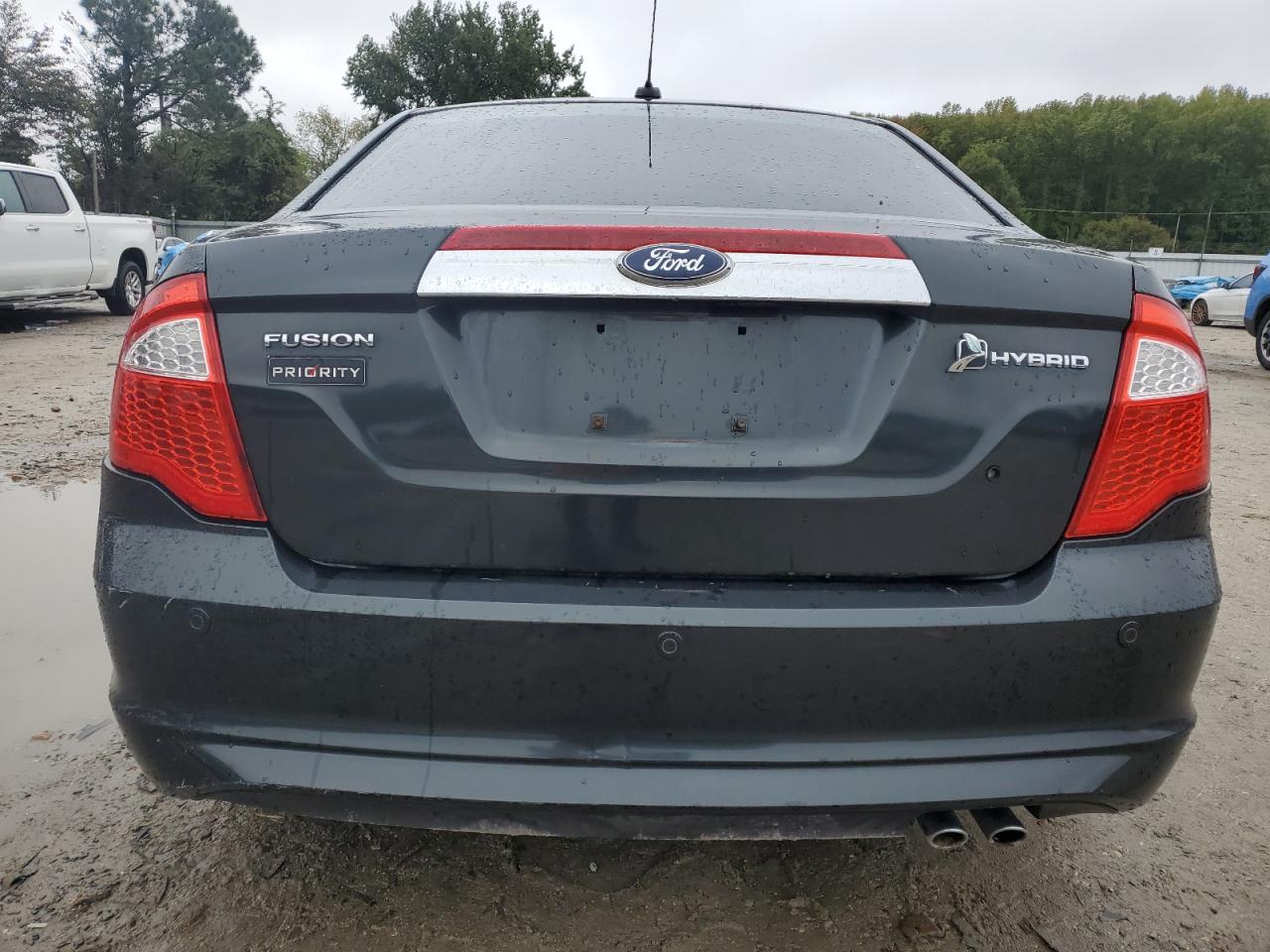 2010 Ford Fusion Hybrid VIN: 3FADP0L34AR228724 Lot: 82331445