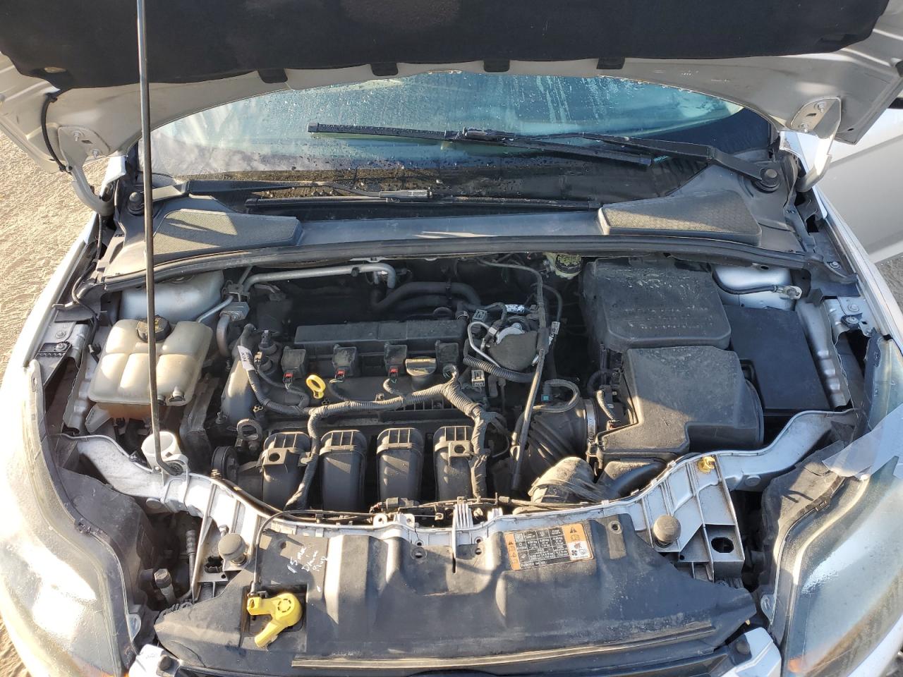 2014 Ford Focus Titanium VIN: 1FADP3J23EL280409 Lot: 82561165