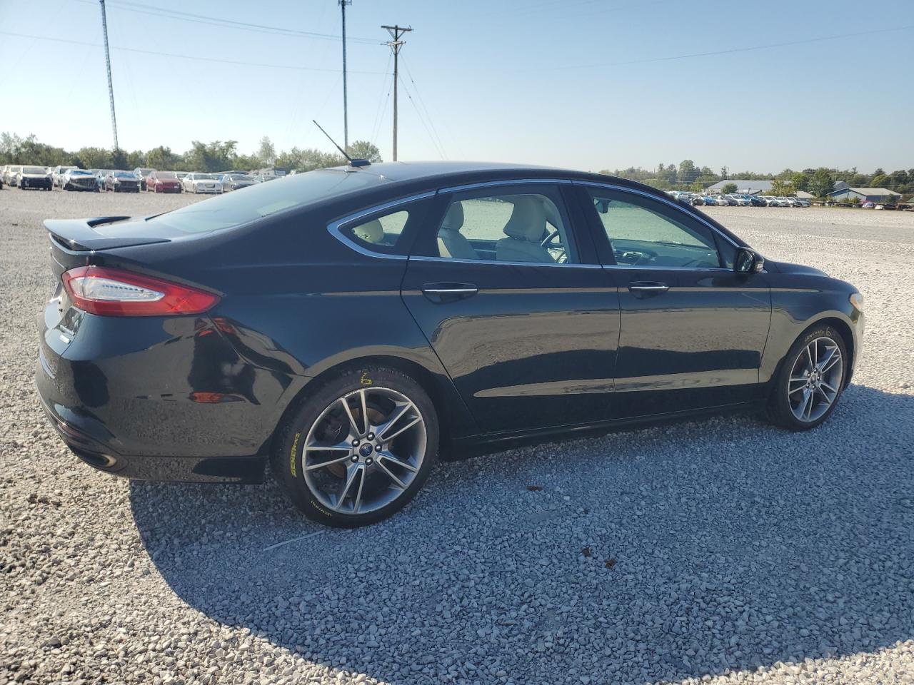 2016 Ford Fusion Titanium VIN: 3FA6P0K99GR205902 Lot: 84415055