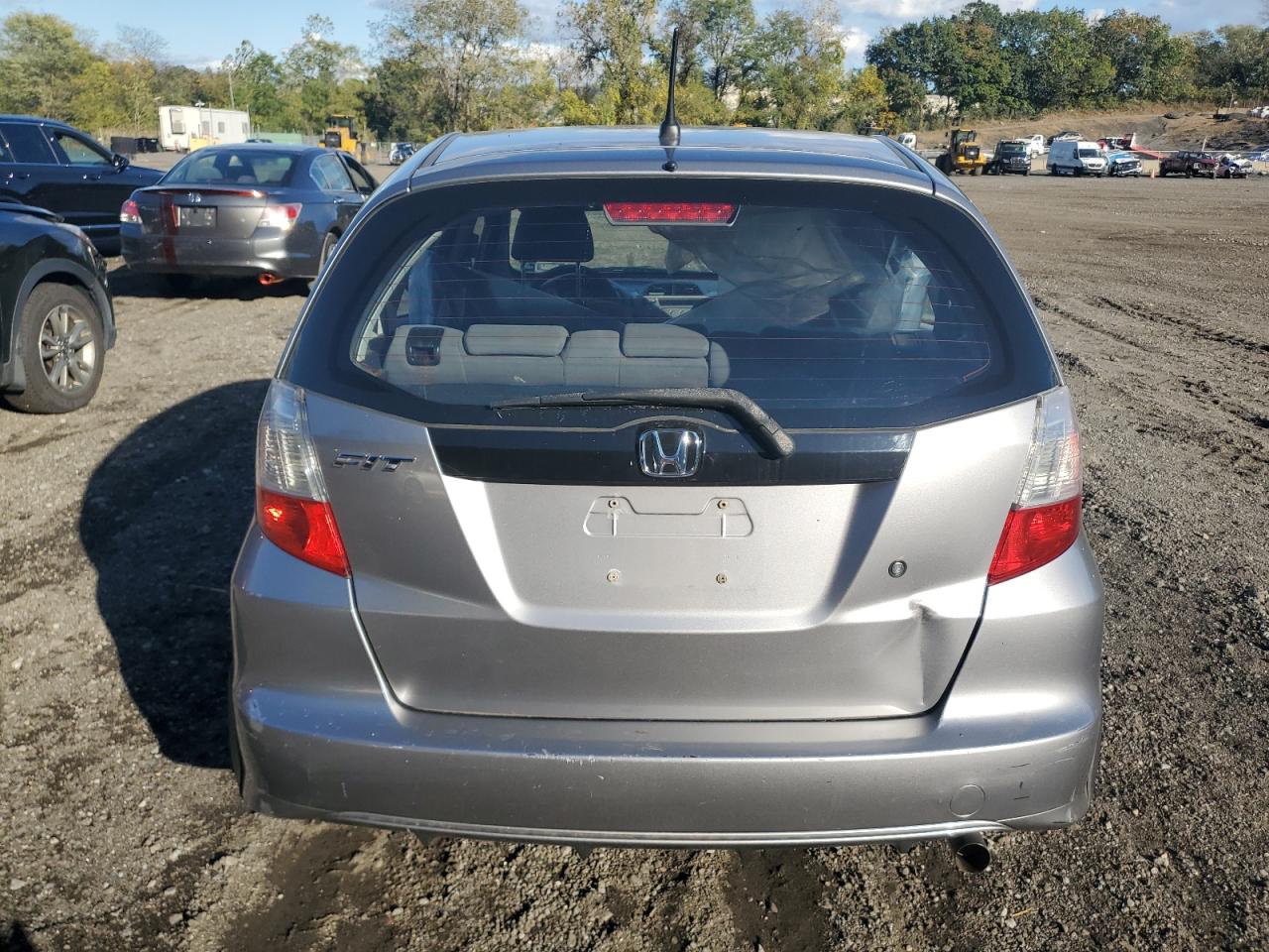 2009 Honda Fit VIN: JHMGE87299C006721 Lot: 84973745