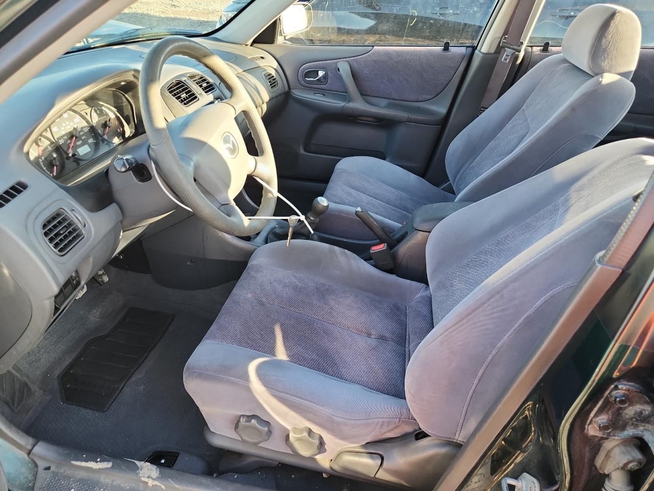 2000 Mazda Protege Es VIN: JM1BJ2218Y0210882 Lot: 84791965