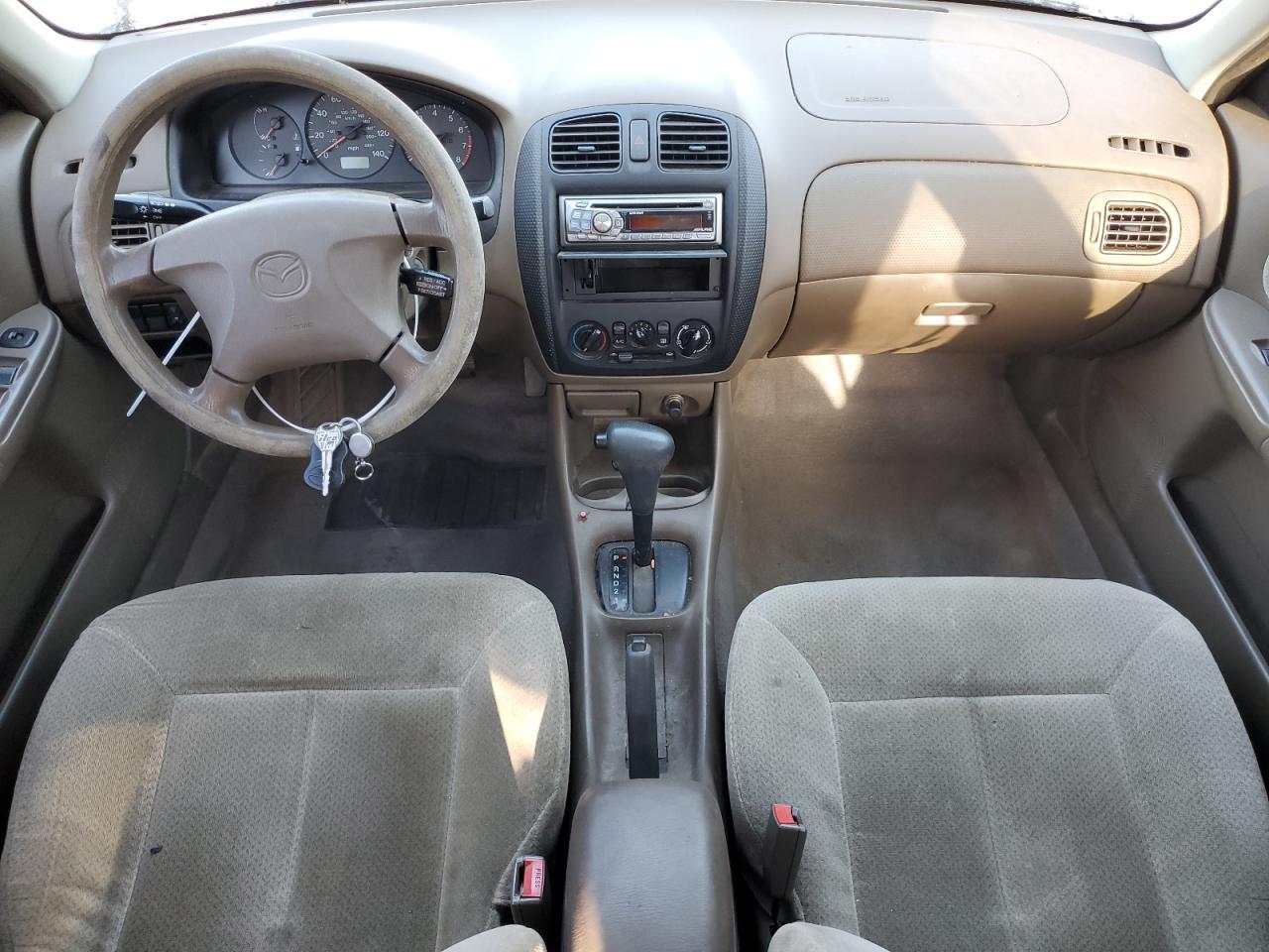 1999 Mazda Protege Dx VIN: JM1BJ222XX0145685 Lot: 87281435