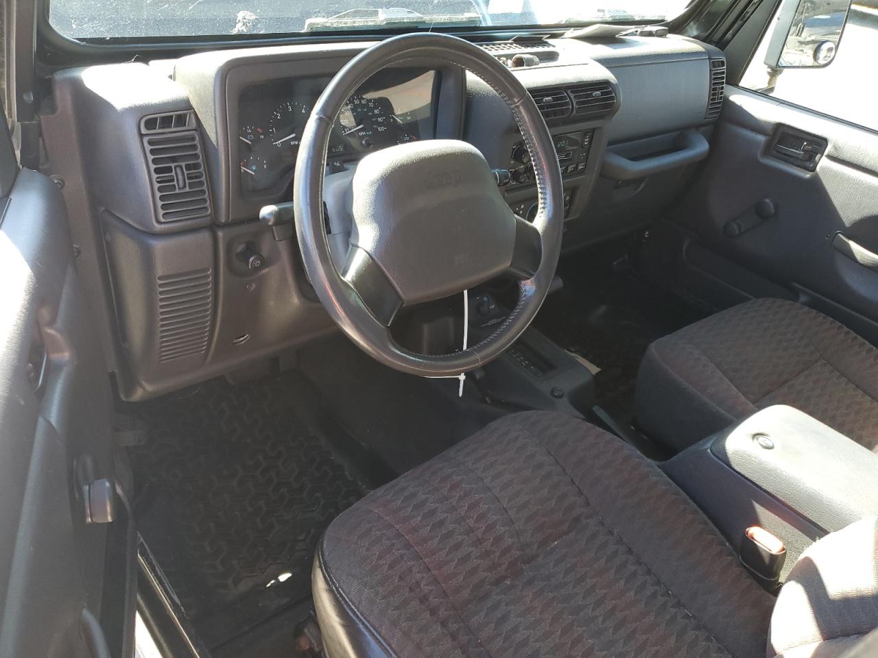 2000 Jeep Wrangler / Tj Sport VIN: 1J4FA49S1YP796600 Lot: 82574545