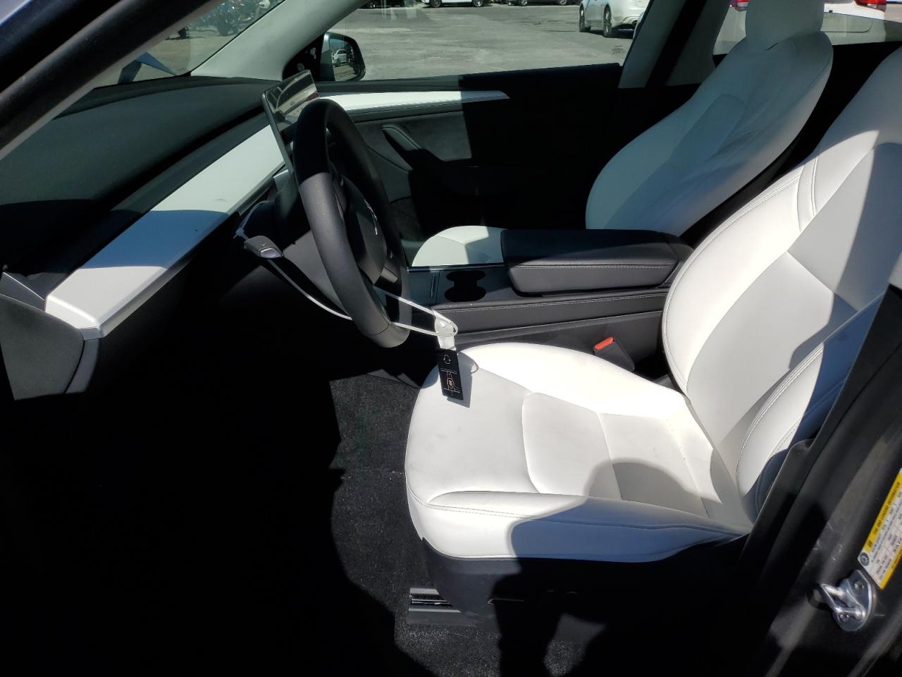 2024 Tesla Model Y VIN: 7SAYGDEE1RA322400 Lot: 87285495