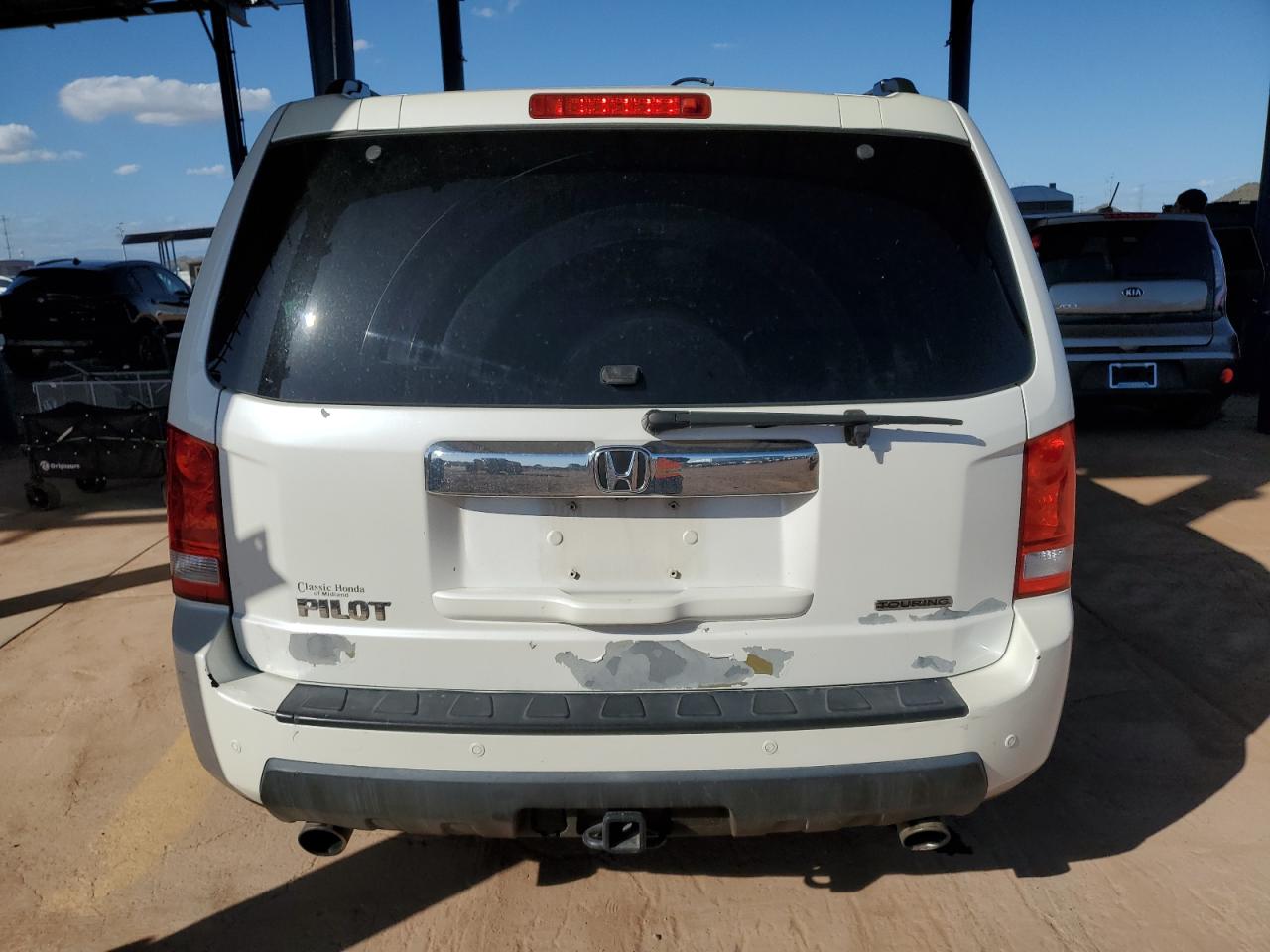 2011 Honda Pilot Touring VIN: 5FNYF3H96BB014303 Lot: 86658005