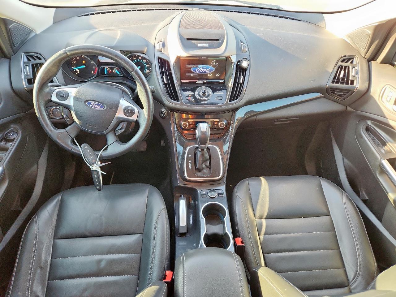 2014 Ford Escape Titanium VIN: 1FMCU0J90EUA37737 Lot: 82308555