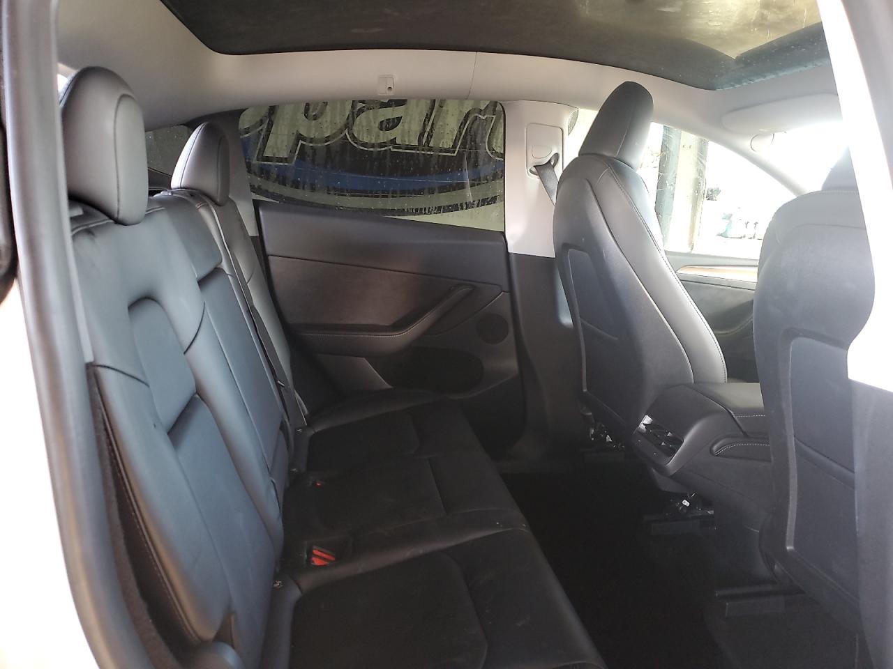 2023 Tesla Model Y VIN: 7SAYGDEE0PF674920 Lot: 84989725