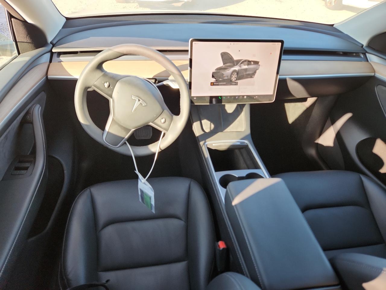 2023 Tesla Model Y VIN: 7SAYGDEEXPA210143 Lot: 82728245