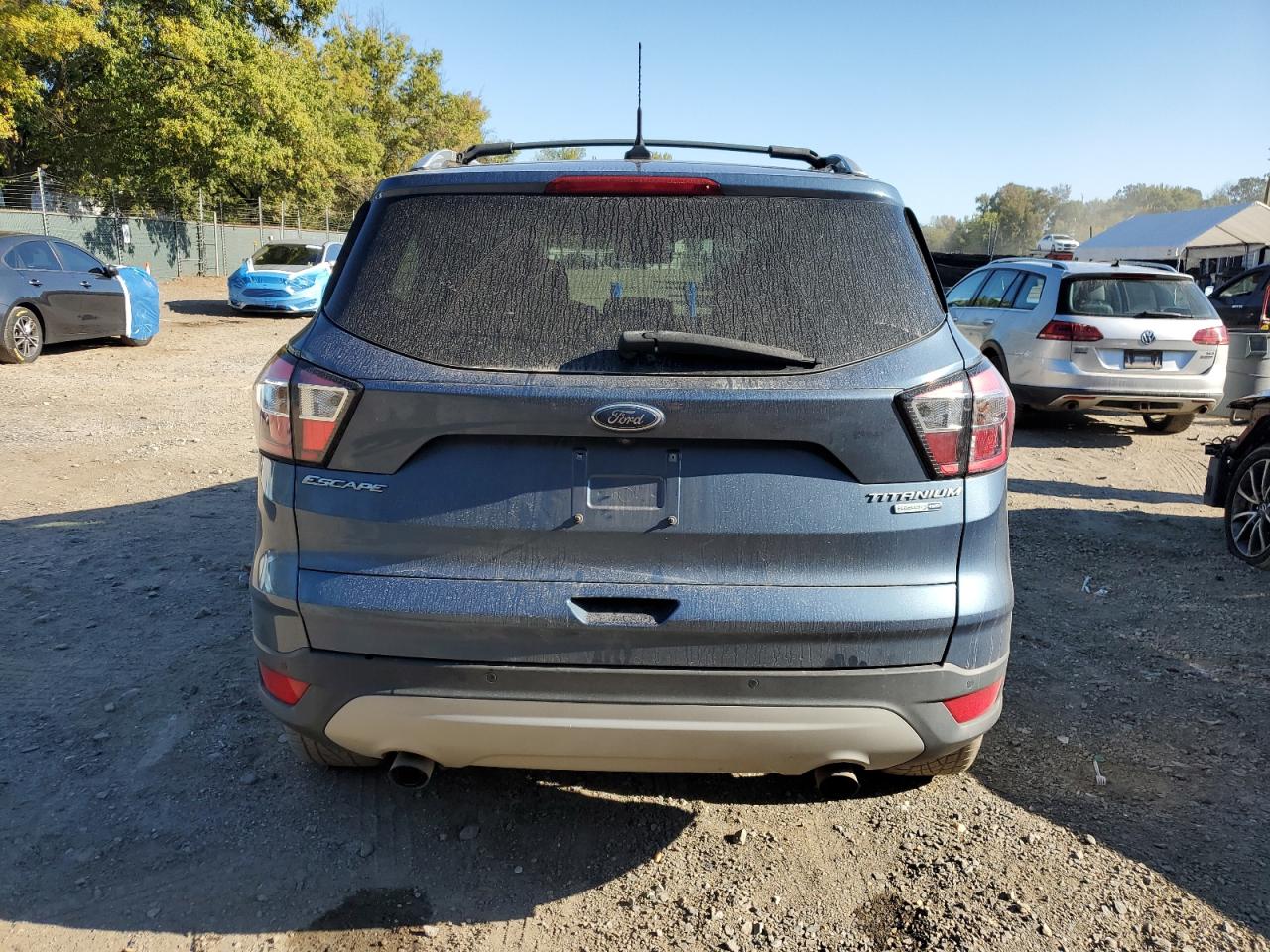 2018 Ford Escape Titanium VIN: 1FMCU9J93JUC01321 Lot: 85292275