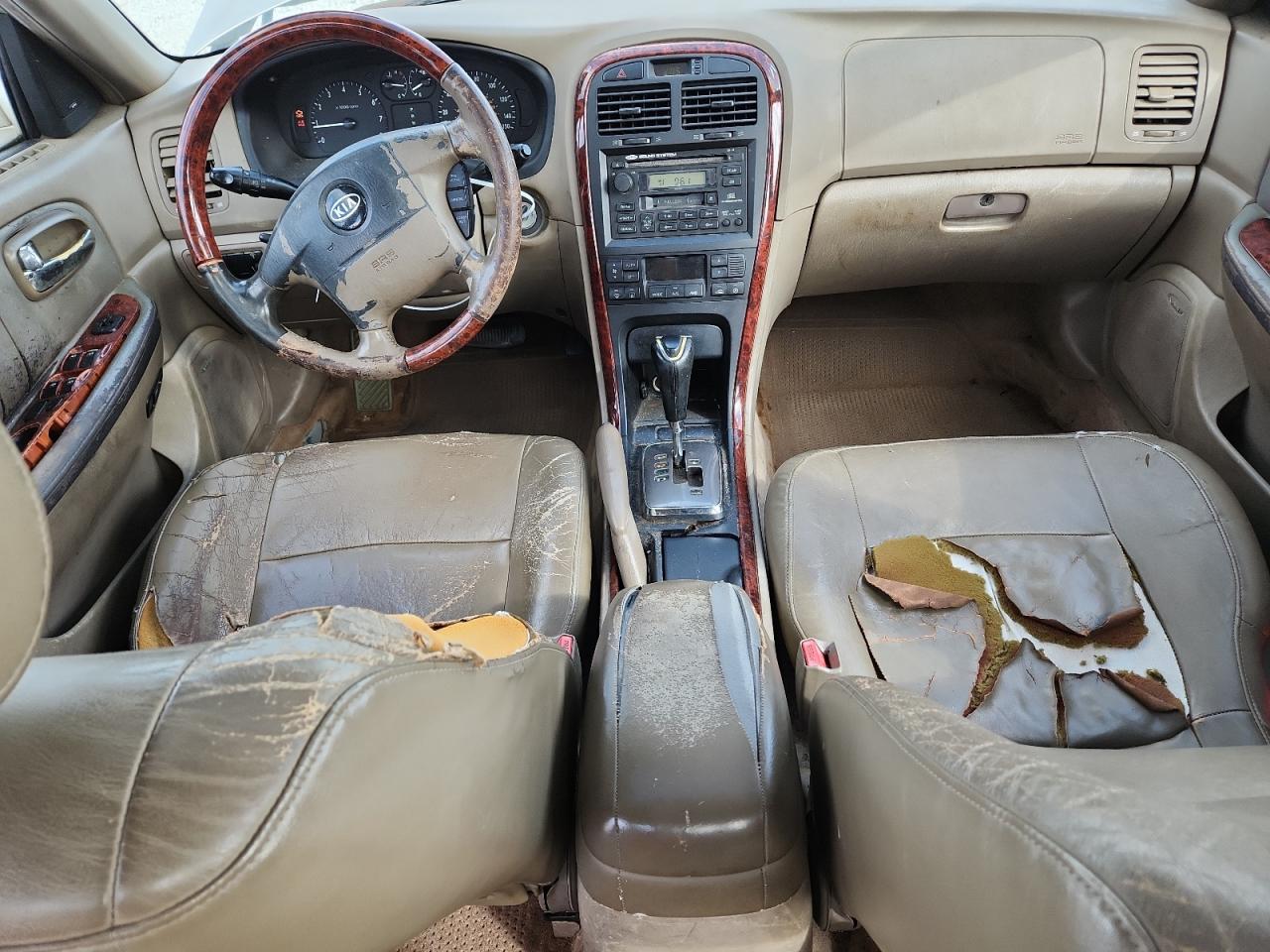 2004 Kia Optima Lx VIN: KNAGD128945318409 Lot: 85505465