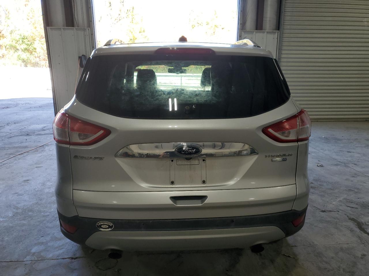 2016 Ford Escape Titanium VIN: 1FMCU9JXXGUA00751 Lot: 82595035