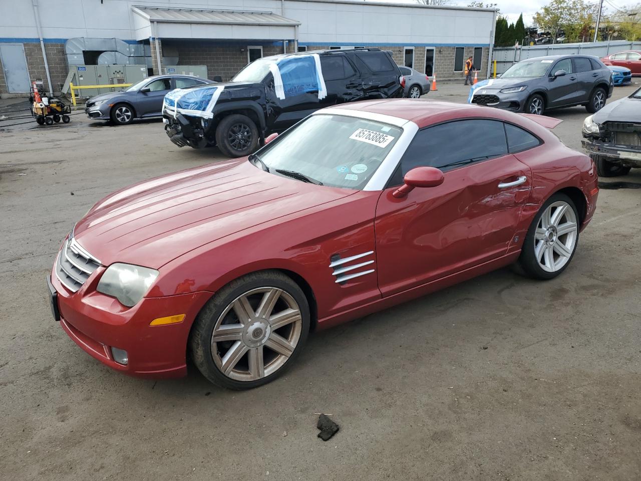 CHRYSLER CROSSFIRE 2004. Lot# 85763885. VIN 1C3AN69L34X018970. Photo 1