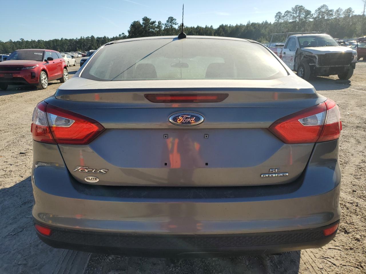 2014 Ford Focus Se VIN: 1FADP3F20EL104331 Lot: 82494905