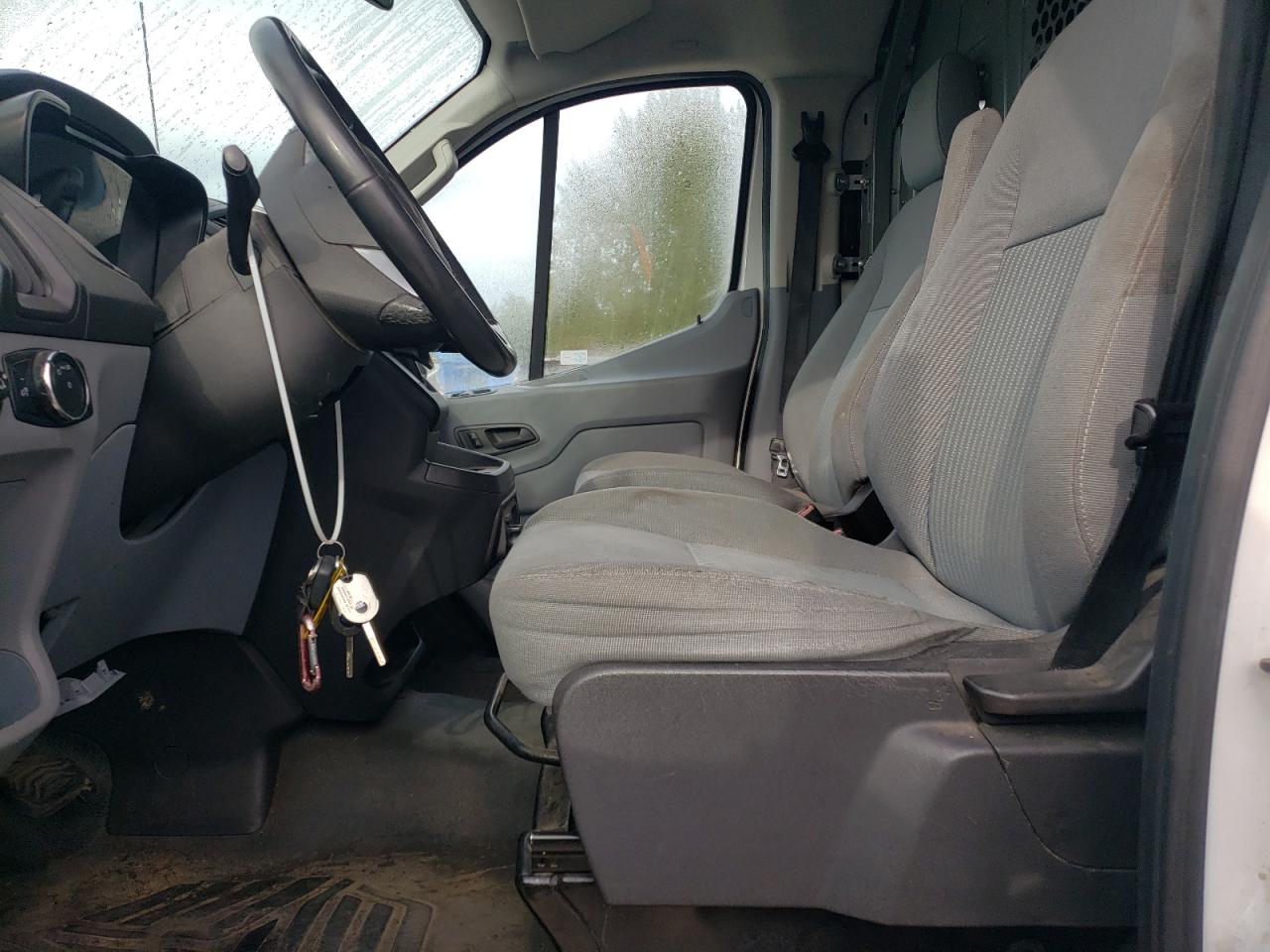 2015 Ford Transit Cargo Van T- VIN: 1FTYR1YG4FKA44113 Lot: 82265195