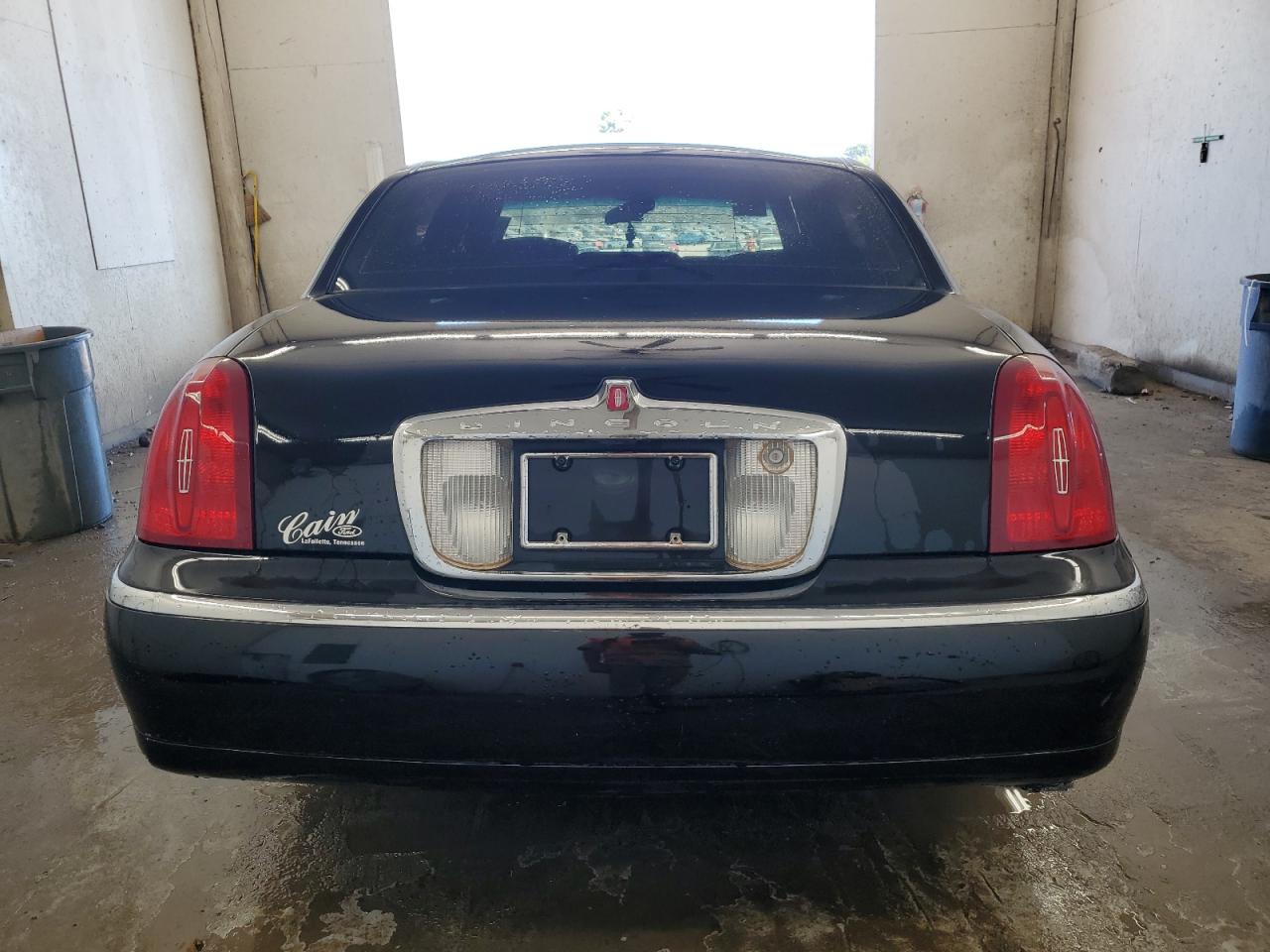 1999 Lincoln Town Car Signature VIN: 1LNHM82W0XY614741 Lot: 84584475