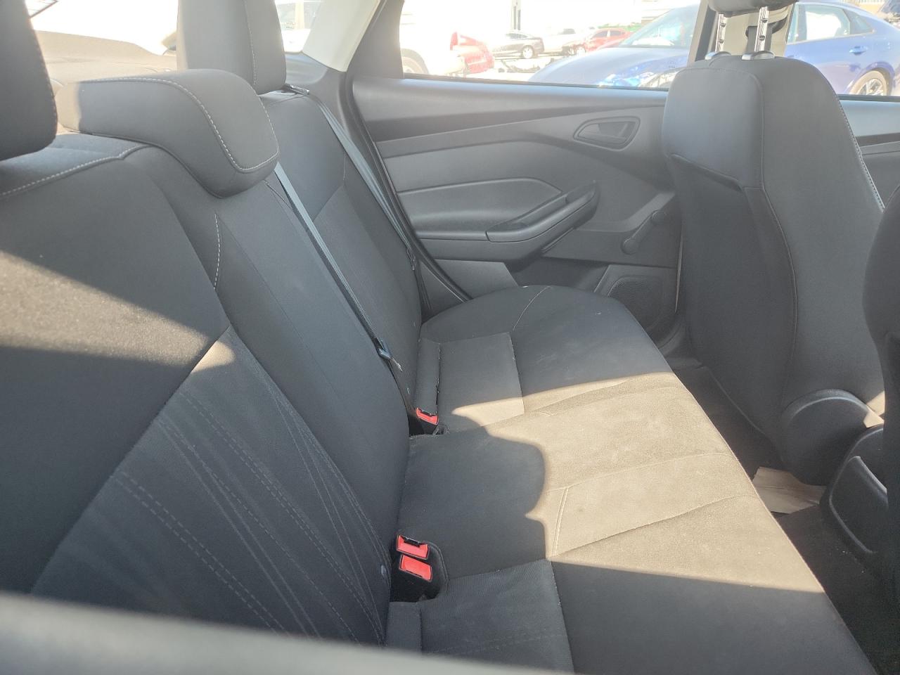 2018 Ford Focus S VIN: 1FADP3E29JL299423 Lot: 84582485