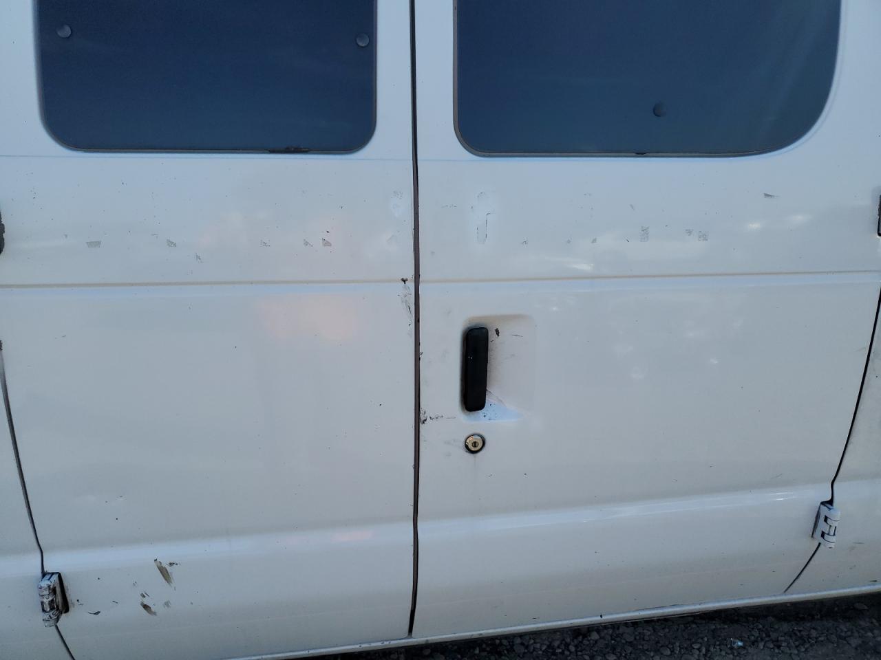 2006 Ford Econoline E350 Super Duty Wagon VIN: 1FBNE31L86DA37773 Lot: 82457695