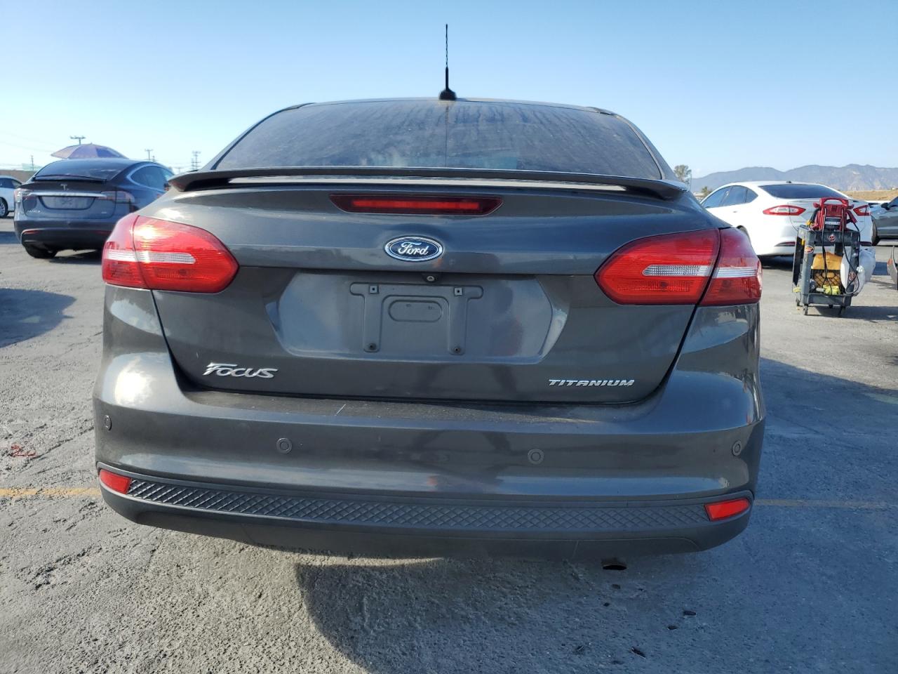 2015 Ford Focus Titanium VIN: 1FADP3J24FL387048 Lot: 82431245